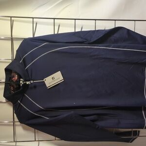 A cute black and white golf shirt size and large